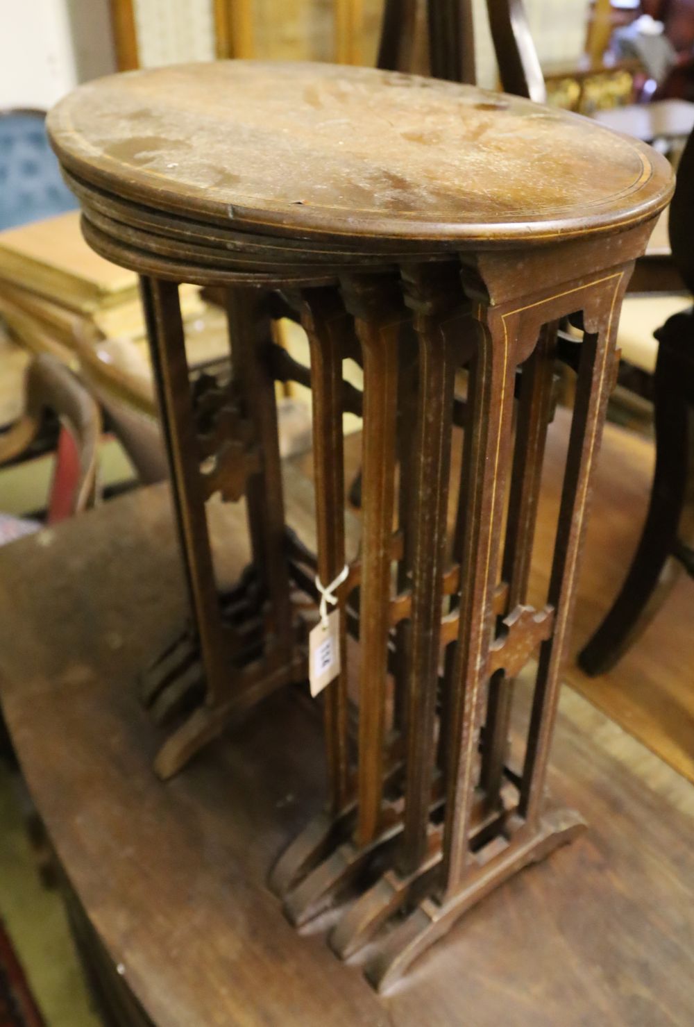 A quartetto of Edwardian oval mahogany tea tables, width 51cm, depth 34cm, height 64cm